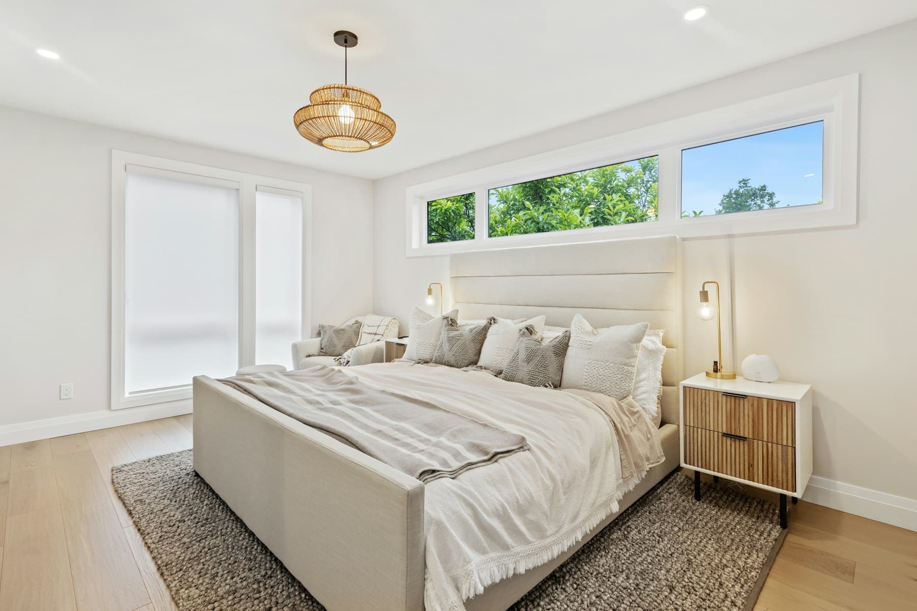 Garden room with a queen bed and morning light
