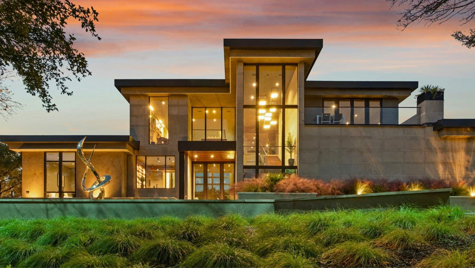 West elevation lit up after sunset